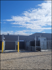 Rear gravel lot entrance